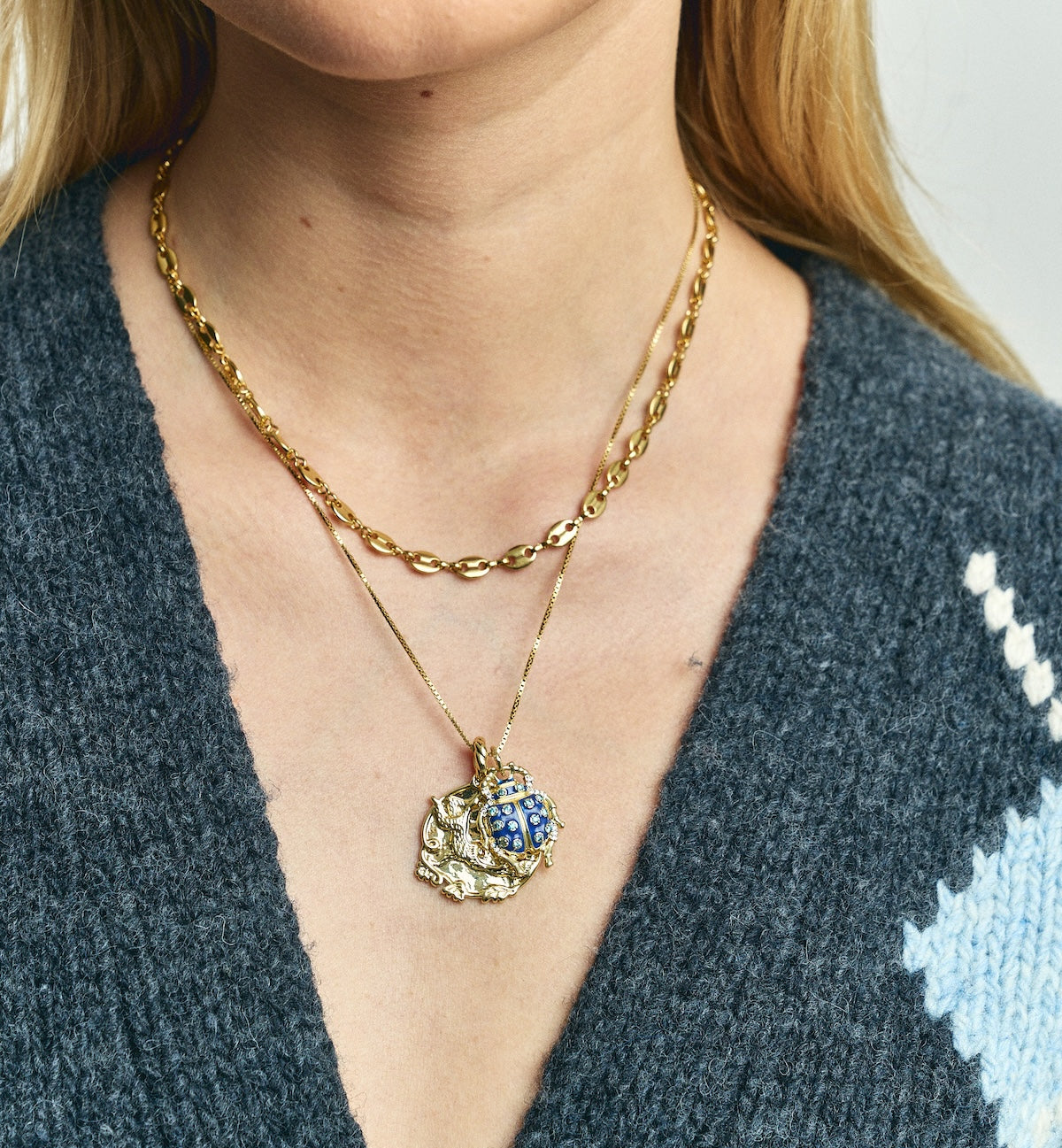 Aquamarine gemstone necklace with bugging you charm
